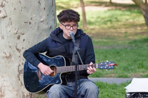 Boy playing a guitar